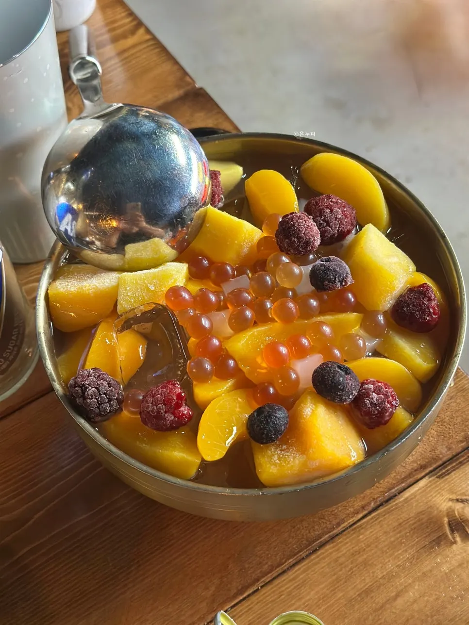 Kettle of No. 10 odeng soup with complimentary fruit punch
