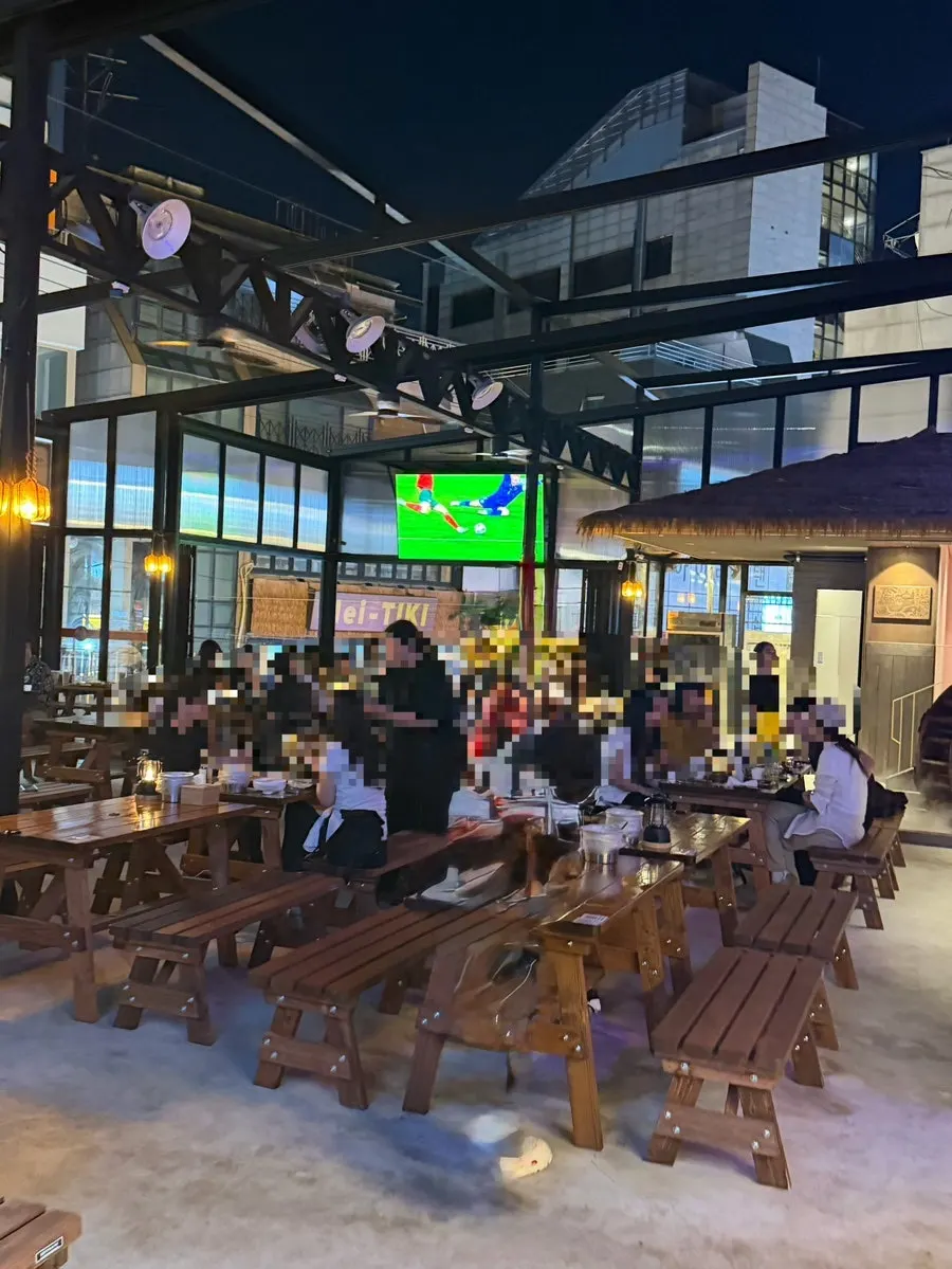 Large screen on one wall of the hall