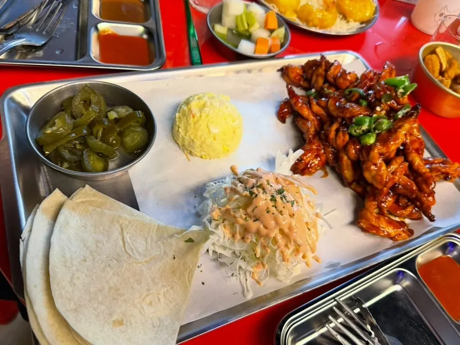 A full plate of the signature charcoal-grilled chicken neck