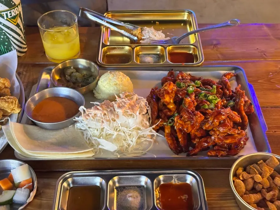 Charcoal-grilled sauced chicken neck on a plate