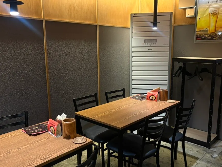 Interior with soft lighting and spaced-out seating