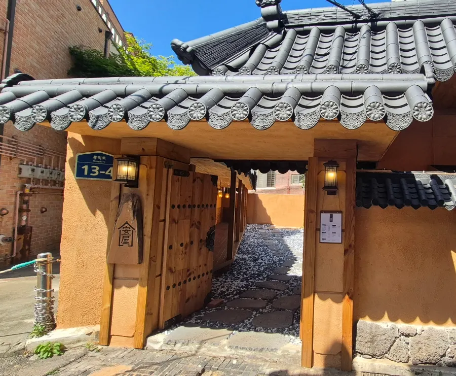 Anok's hanok-style exterior in a Hongdae alley