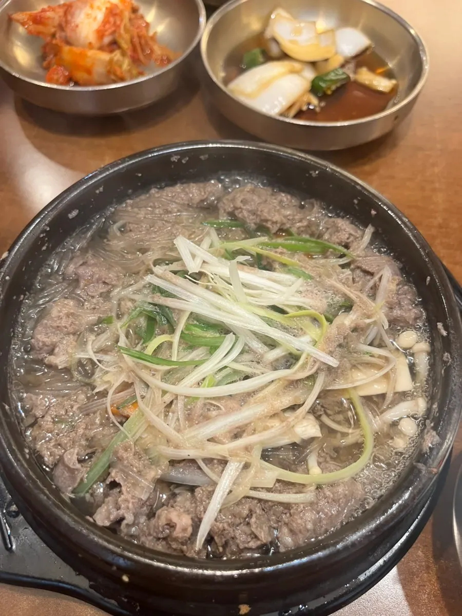 Yukjeon topped with onion and cheongyang chili in soy sauce
