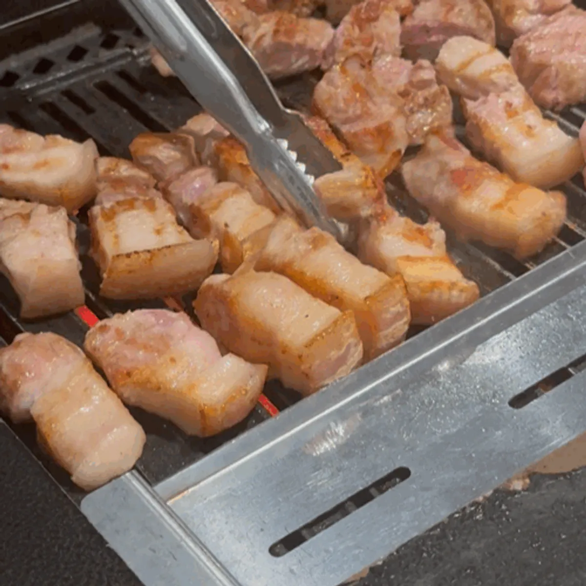 Additional order of marbled samgyeopsal and premium hangjeongsal