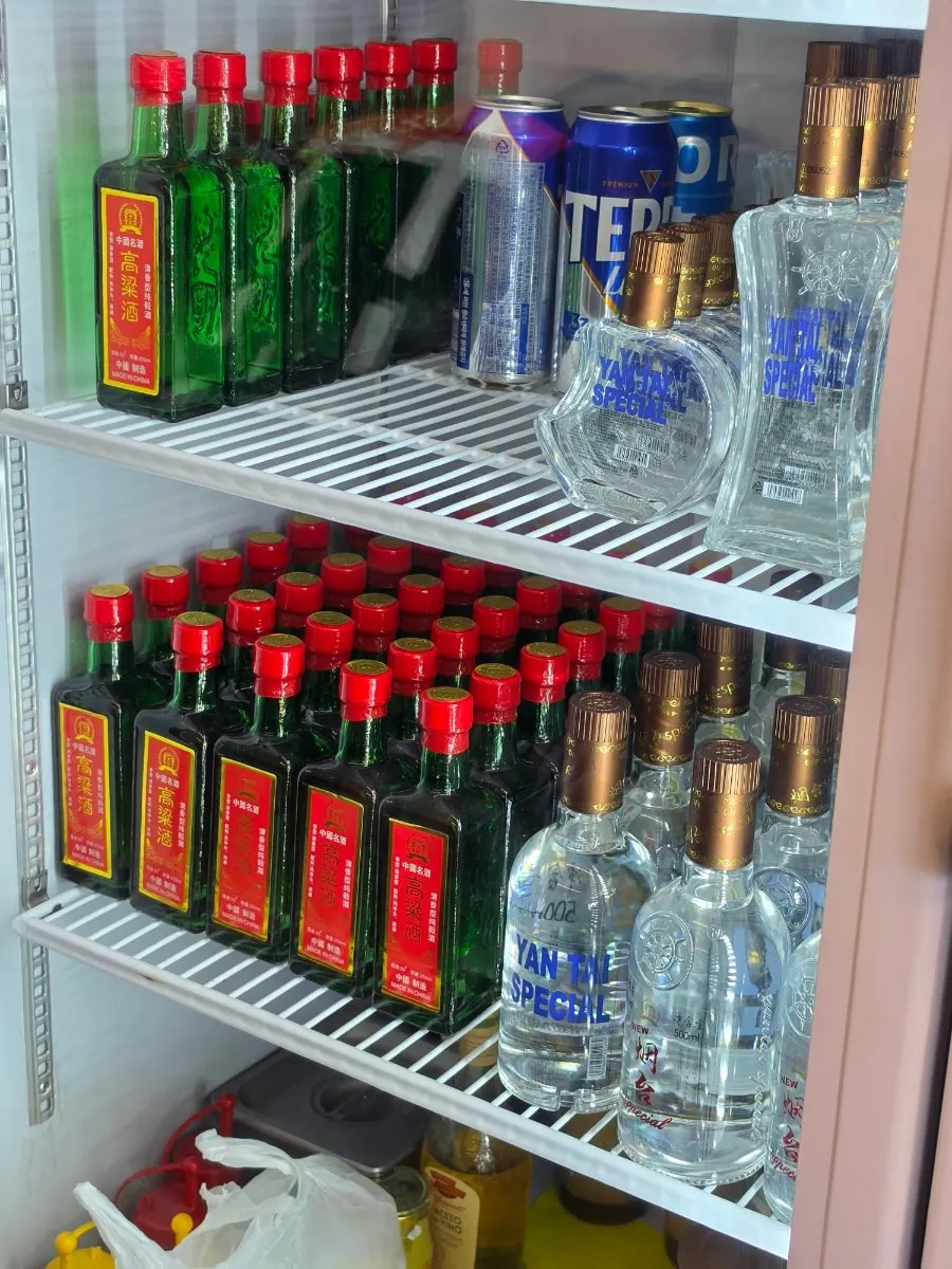 Fridge stocked with Chinese liquors at Hongmigwan