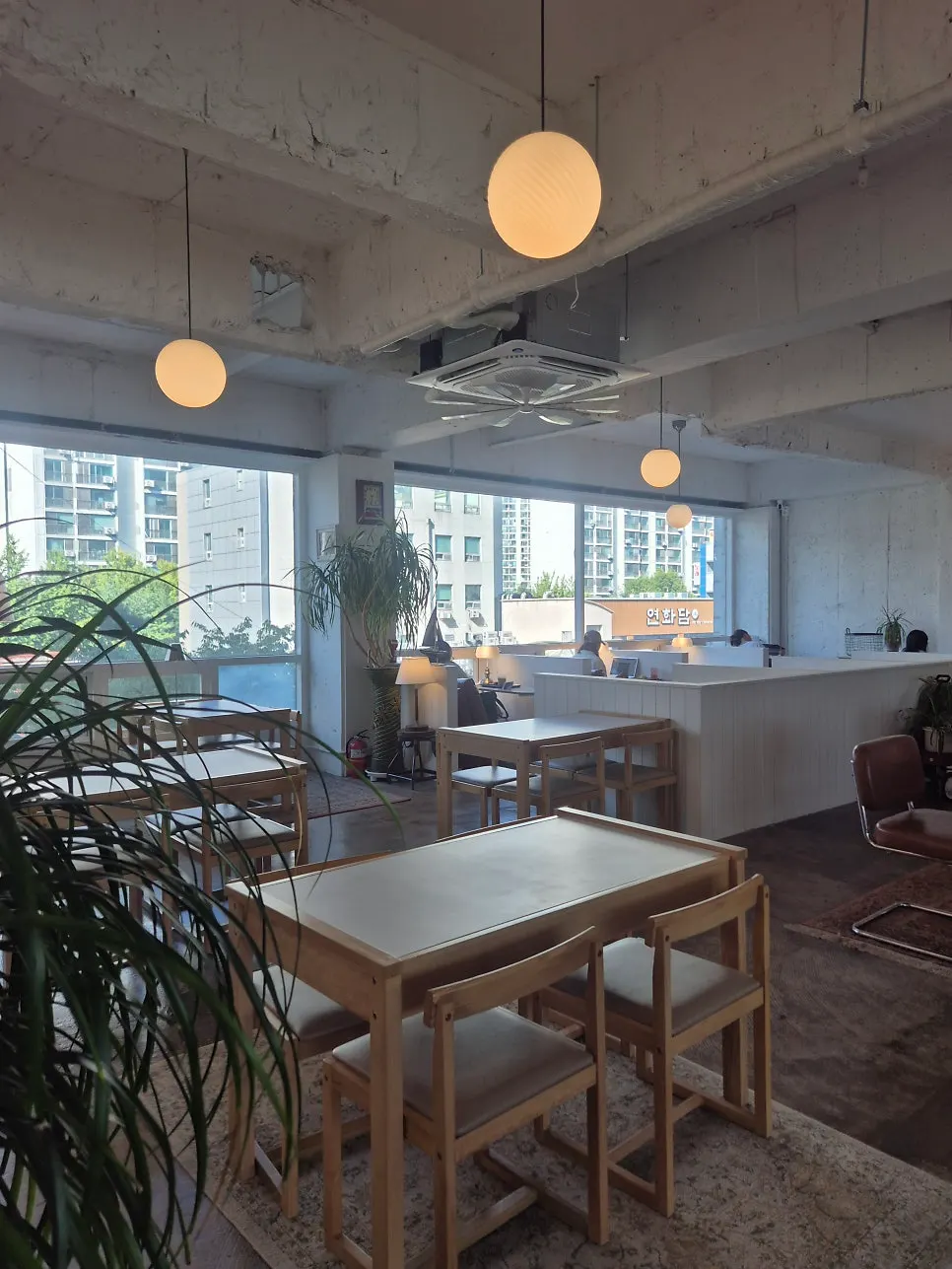 Café interior seating with several tables