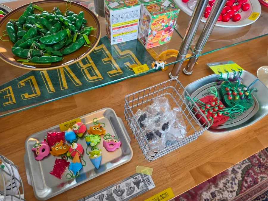 Cute keyrings hanging on a display stand