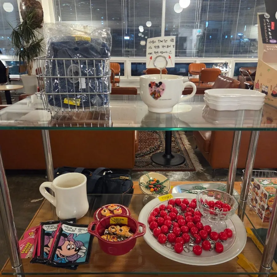 Mini flags, lamps, and other retro-vibe decor on display
