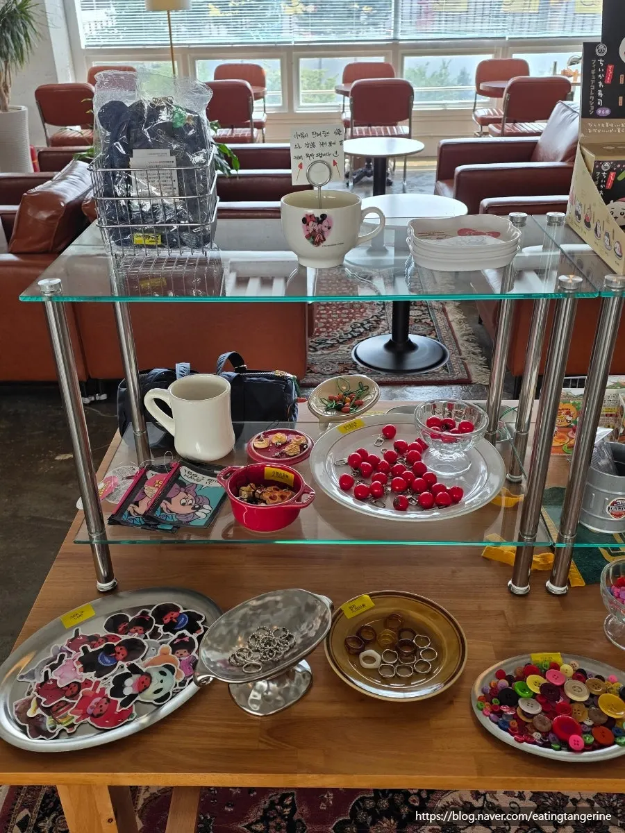 Stickers and rings sold at the café