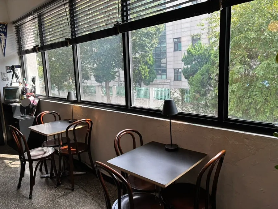 Café hall filled with soft sofa seating
