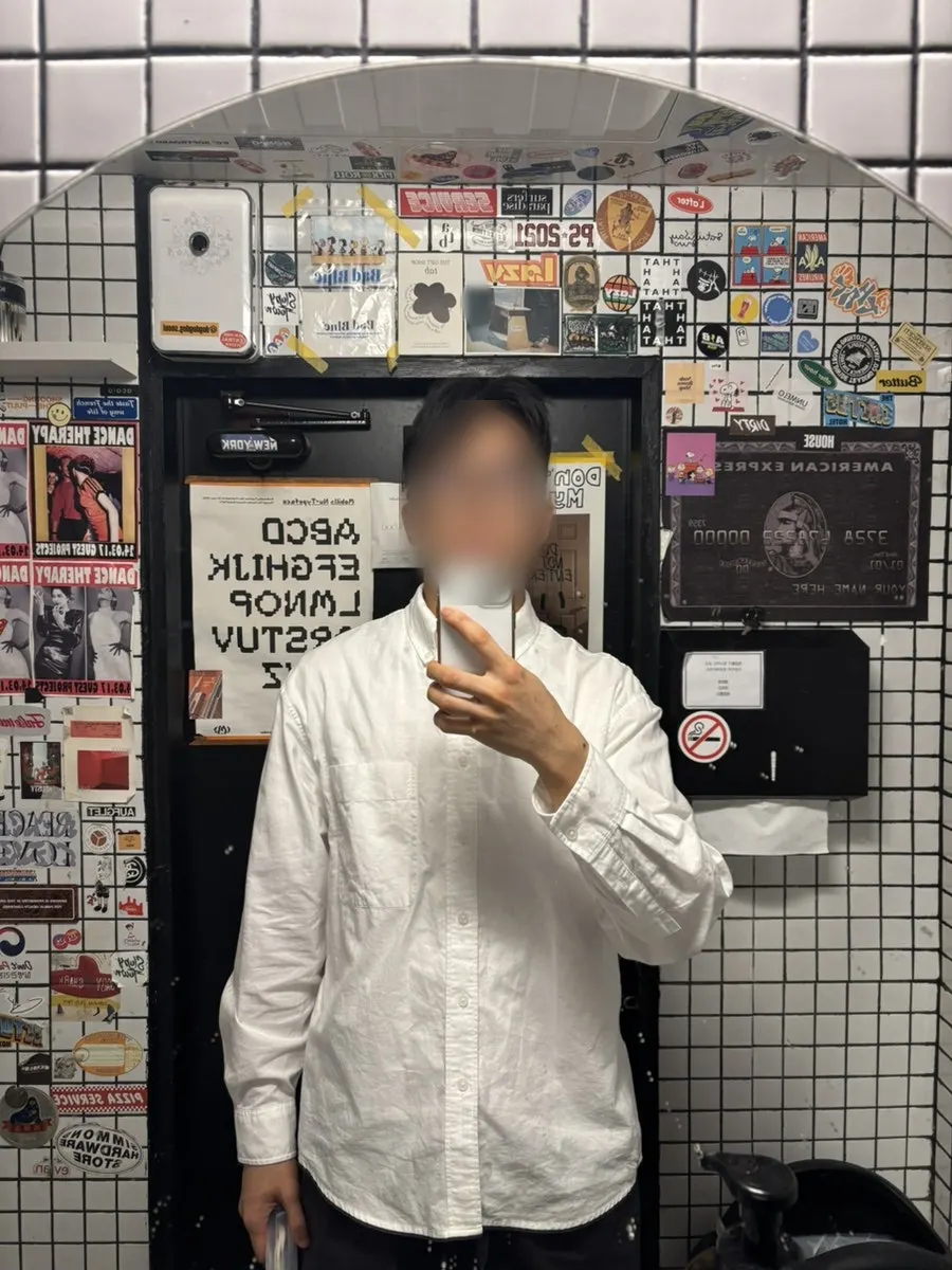 Restroom inside the store decorated with hip stickers
