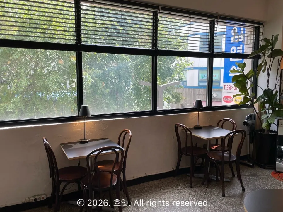 Retro window seat with a view of trees