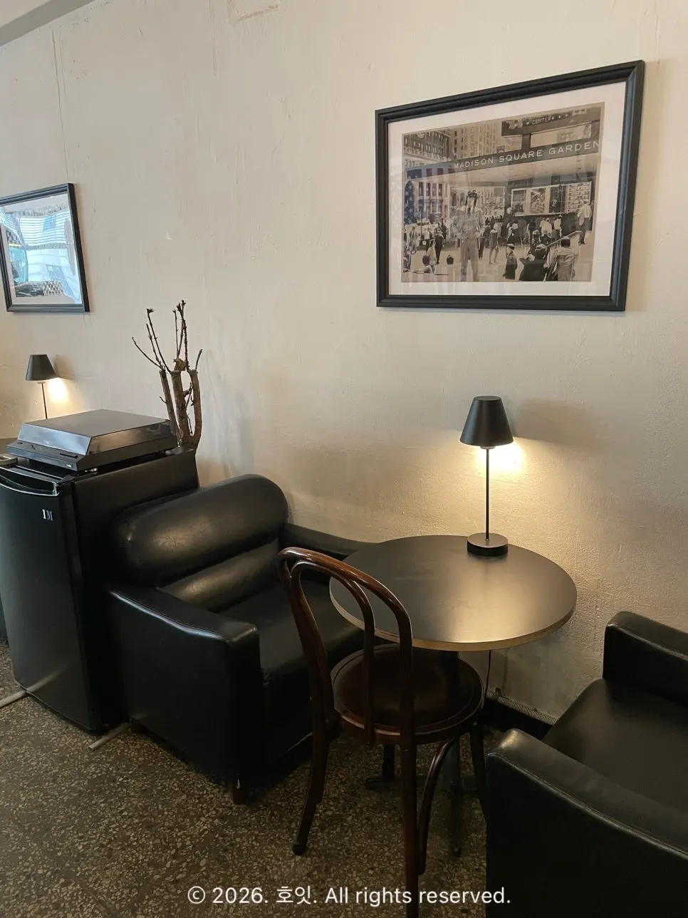Plush 2-person sofa table along the wall