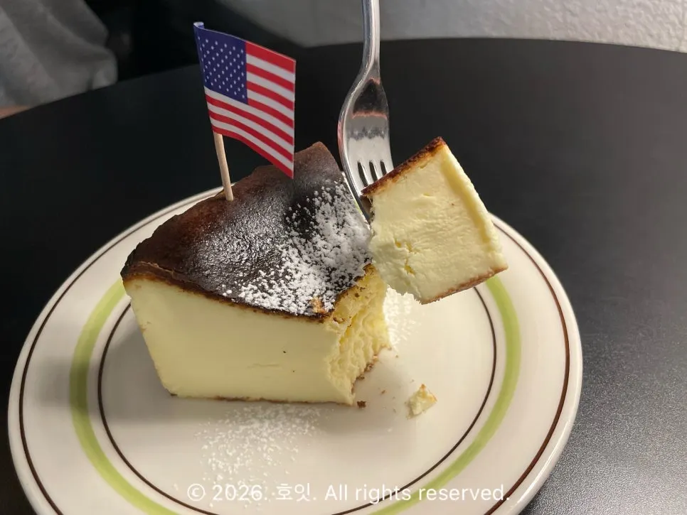 Cross-section of the dense Basque cheesecake