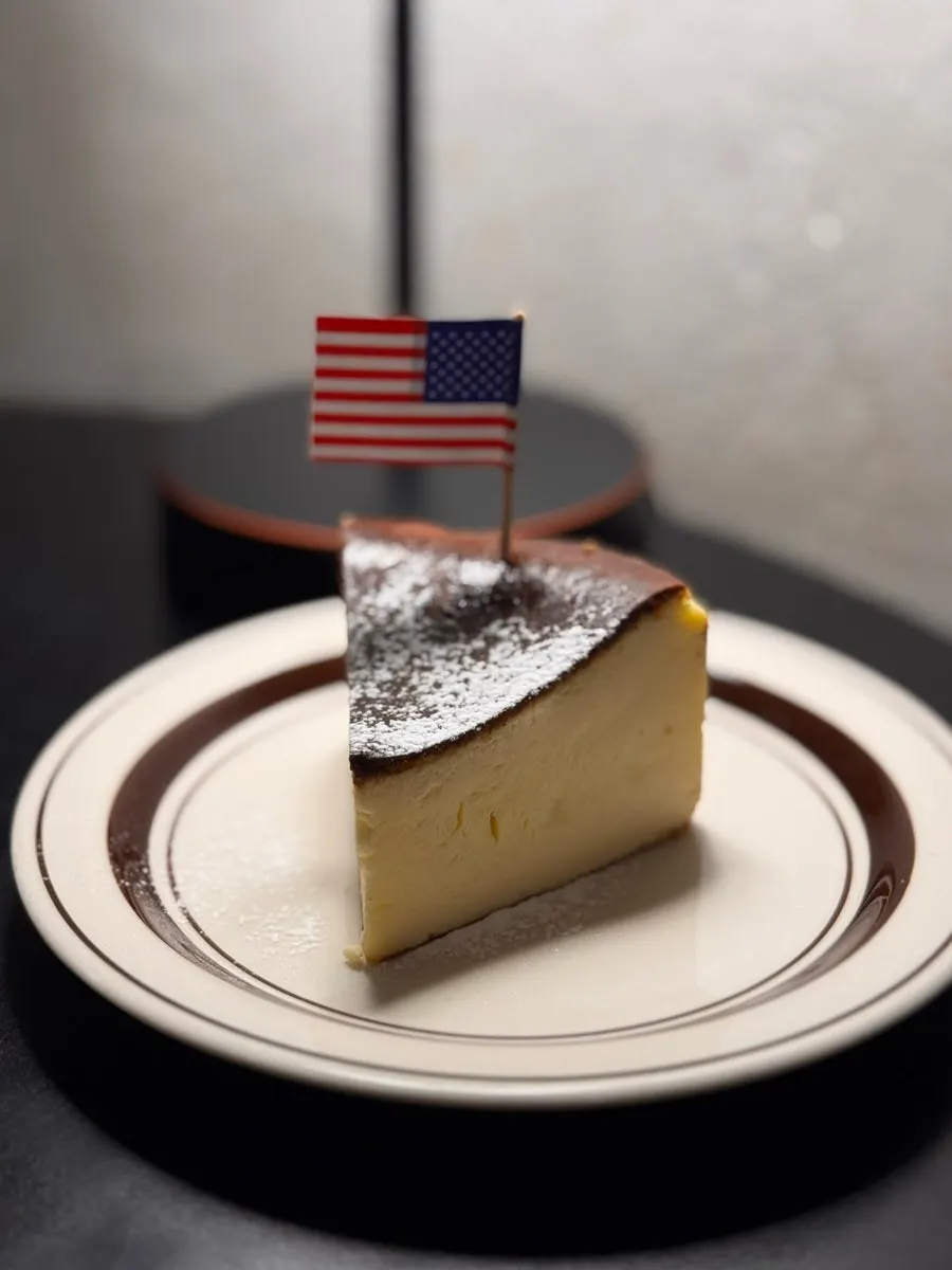 Forkful of the dense Basque cheesecake cross-section