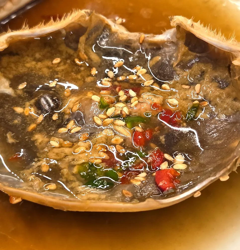 Soy-marinated raw crab with meat picked out