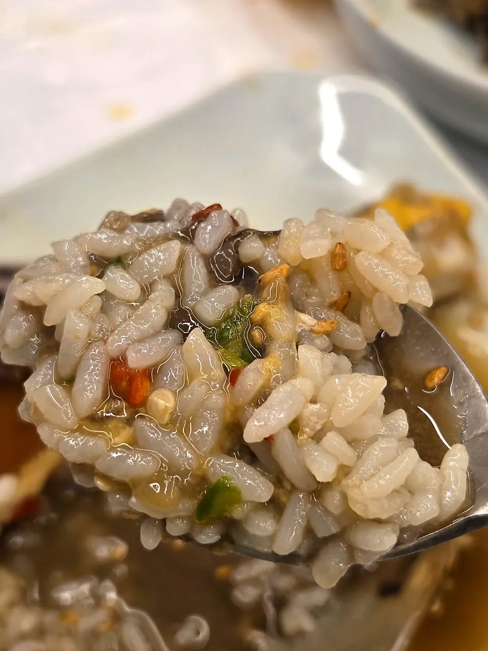 Rice mixed into a soy-marinated crab shell