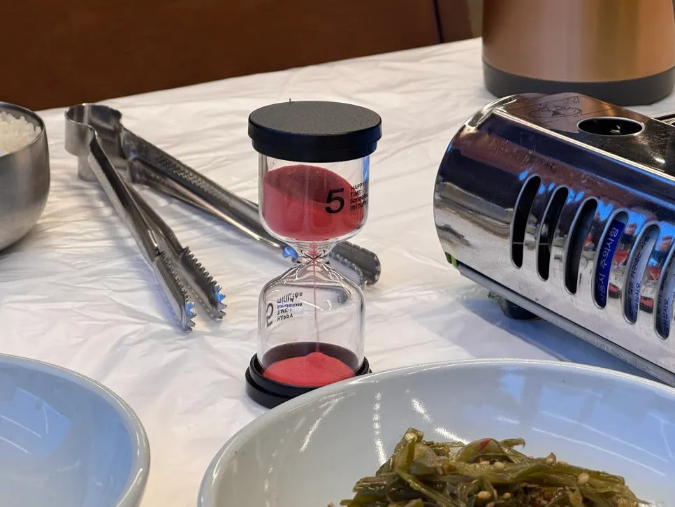 Sand timer served alongside the crab soup