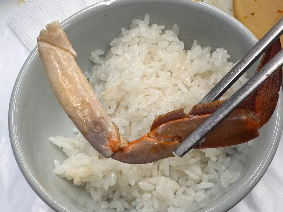 A crab leg section yielding meat