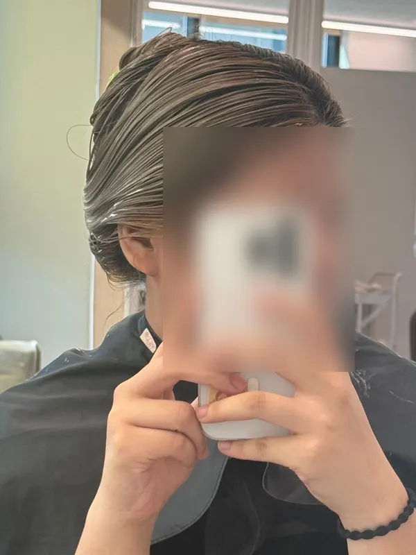 Designer applying clinic product generously