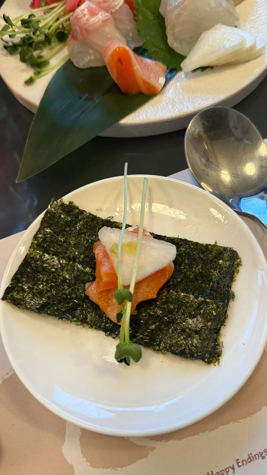 Close-up of thickly sliced aged salmon sashimi