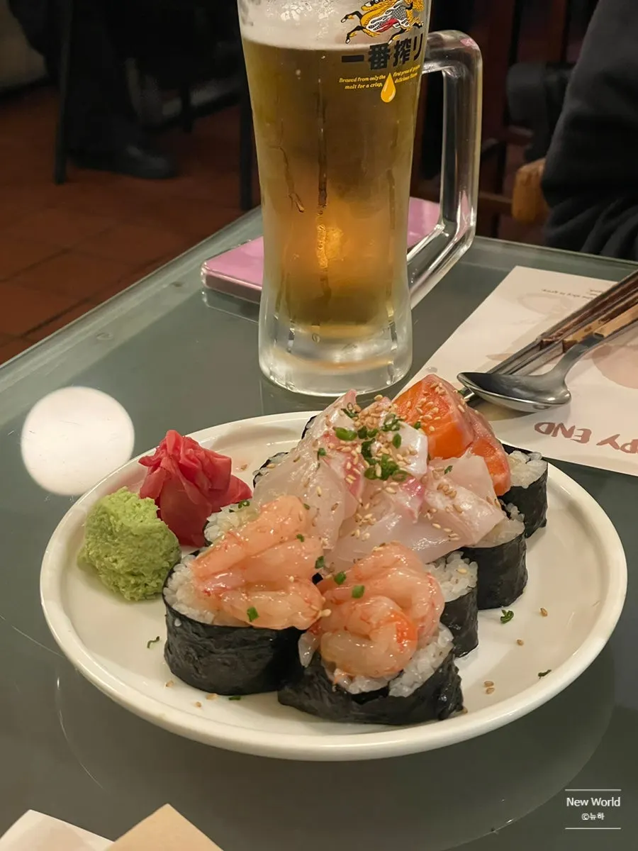 Picking up a piece of aged flounder sashimi