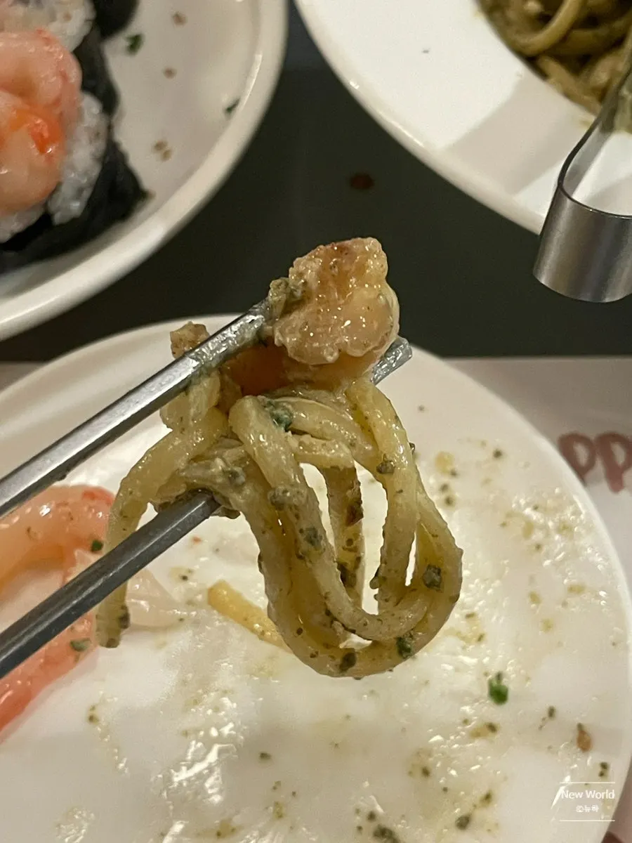 The remaining abalone innards pasta on the plate