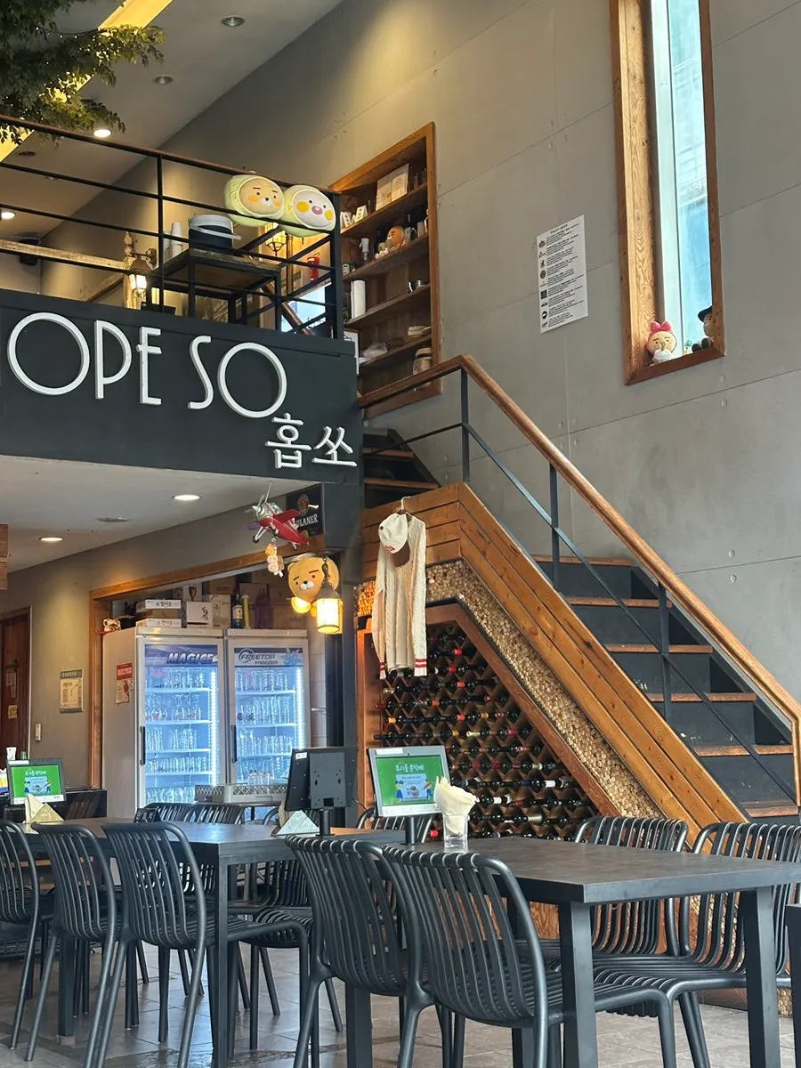 Interior of Hope So's two-story space with high ceilings