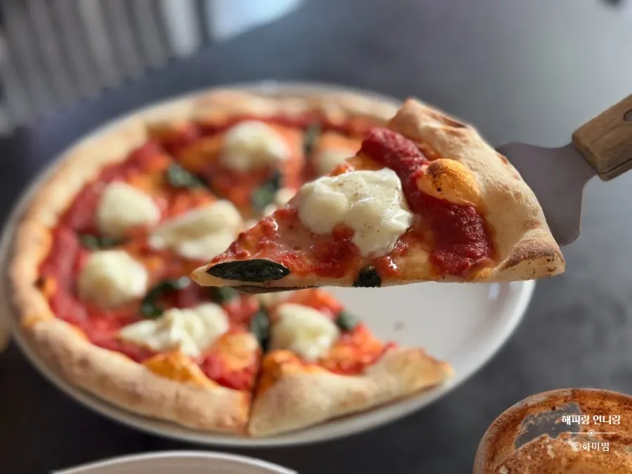 Margherita pizza fresh from the wood-fired oven