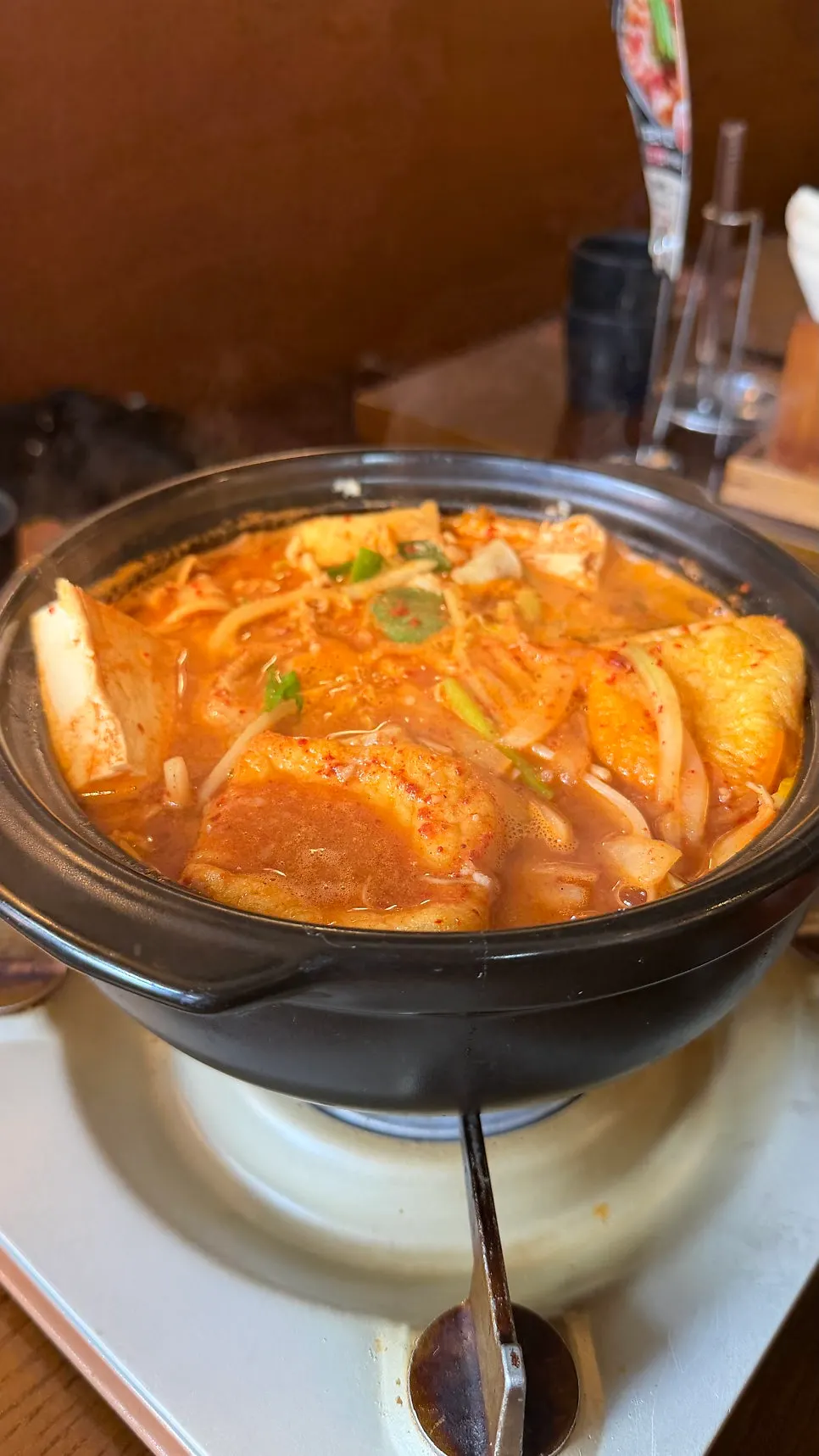 Spicy gopchang hot pot broth starting to boil