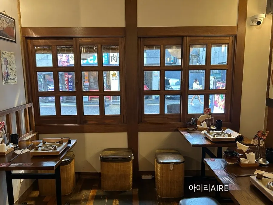 Wood-toned Japanese izakaya-style interior