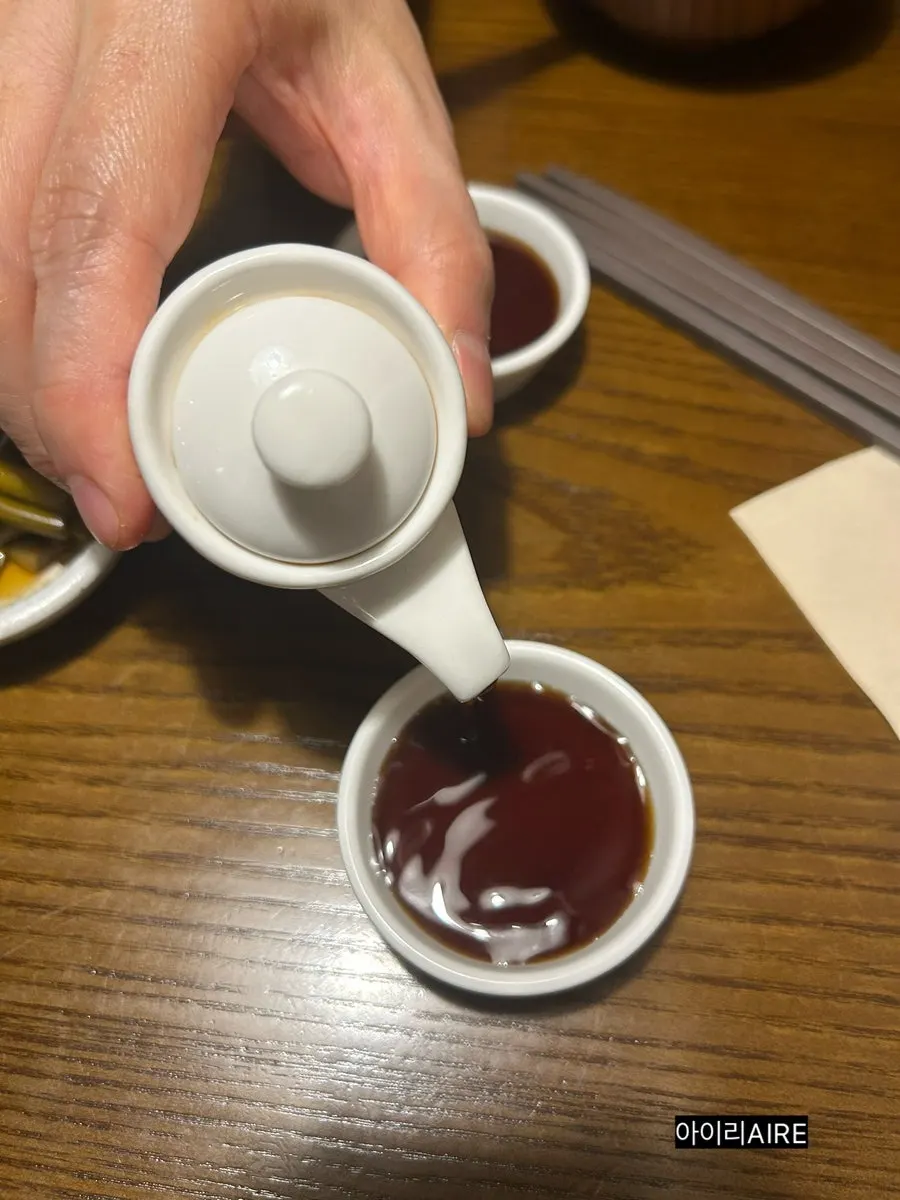 Tofu and fish balls dipped in yuzu soy sauce