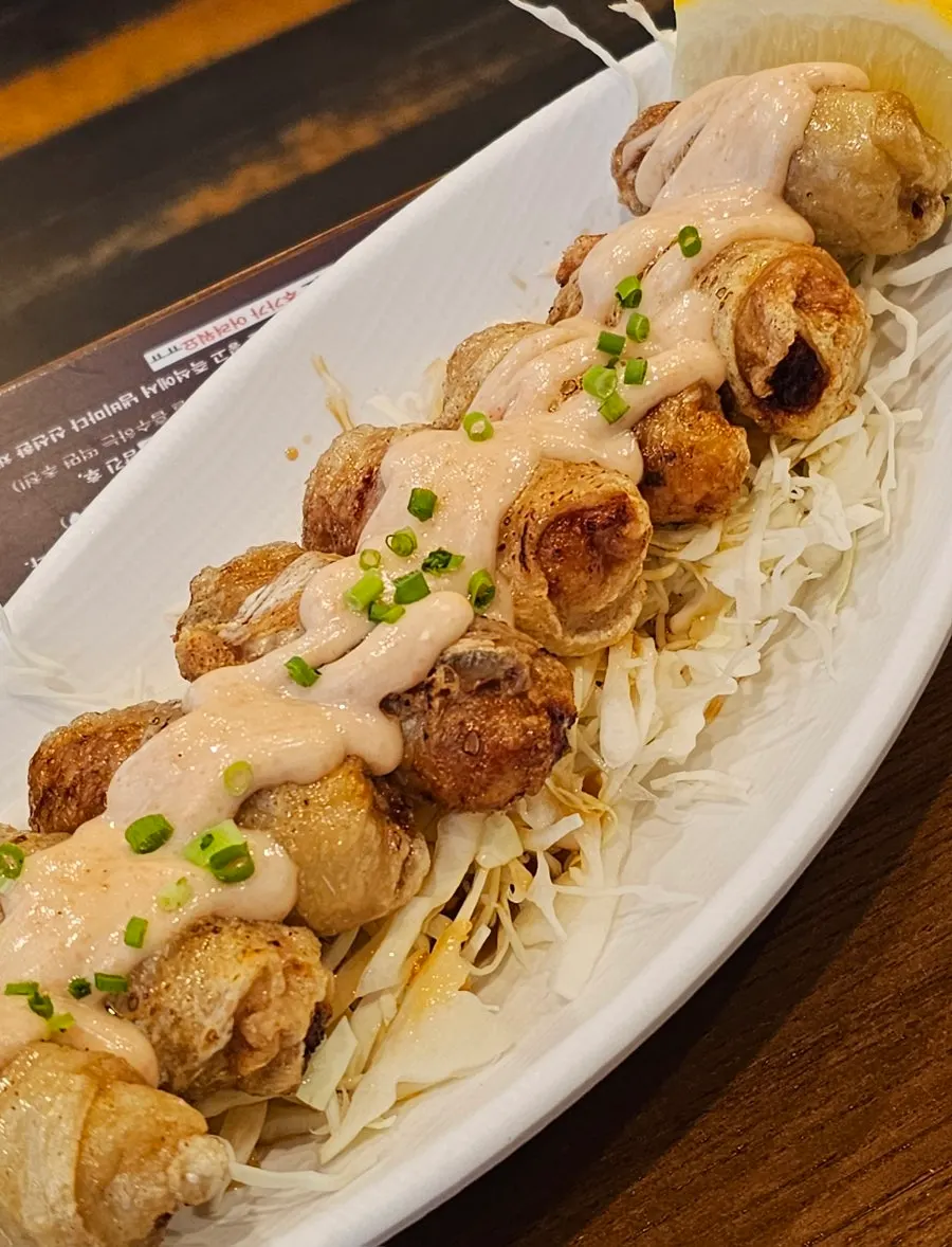 A plate of Horangi Gul's mentaiko mayo gyoza