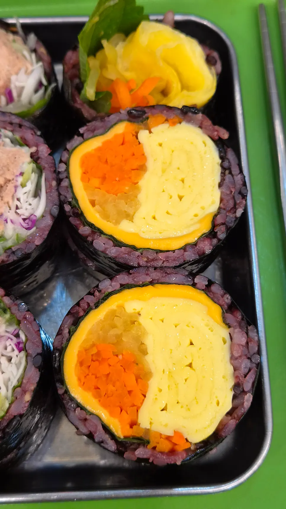 Final table setting with gimbap and dakgangjeong together