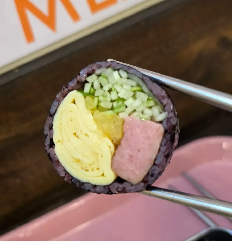 Cross-section of spam gimbap showing the packed filling