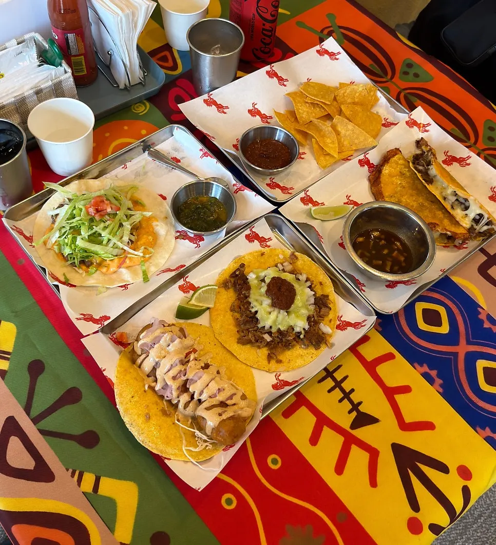 Taco set for two filling the table