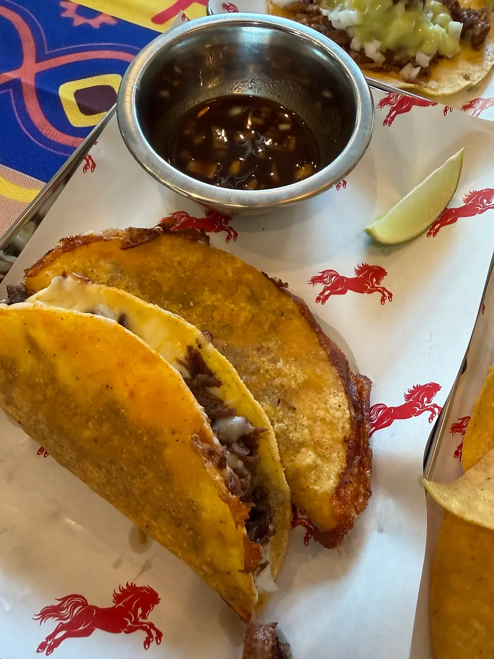 Holding a taco with a plastic glove on