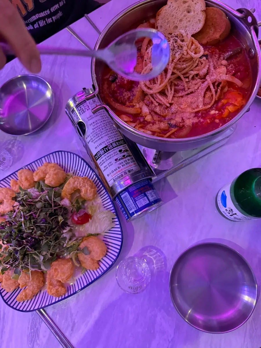 Second-round drinking table with soju and side dishes