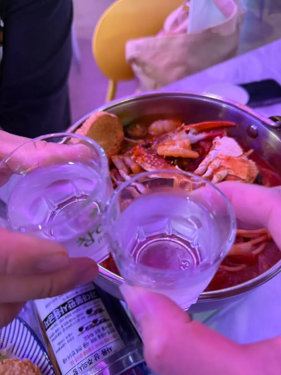 Sharing shrimp and salad together at the table