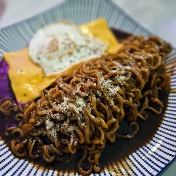 Close-up of melted cheese on jjagyechi