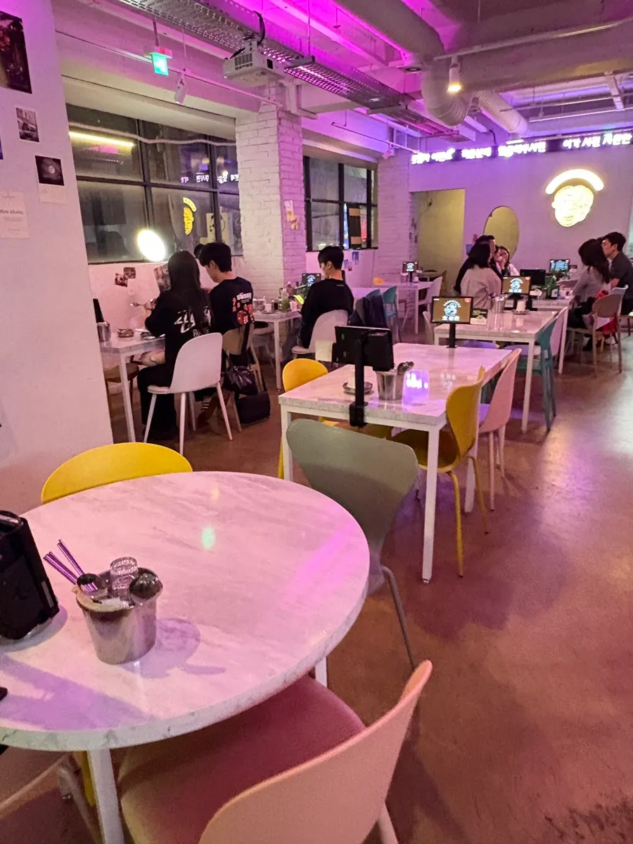 Interior of Ho Samchon lit with purple lighting