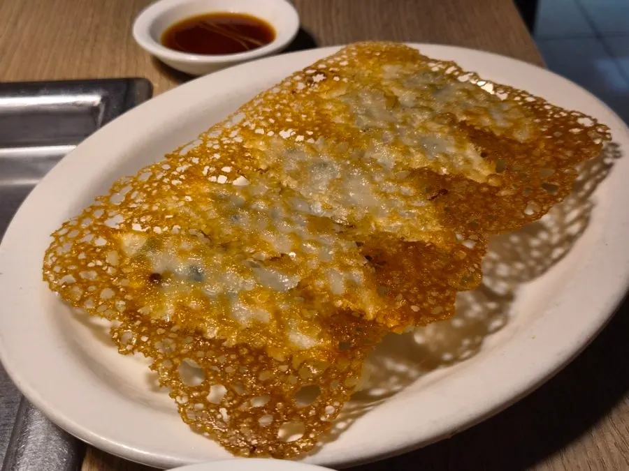 Yaki gyoza with a crispy bottom served with ginger soy sauce