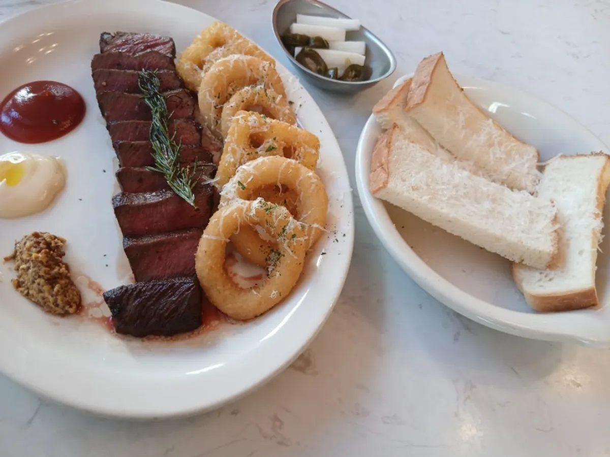 Plated house steak at Hôtel de Couture
