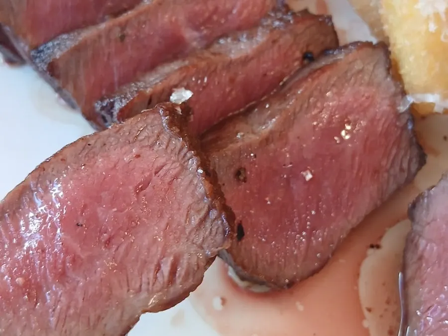 A piece of steak showing its tender grain