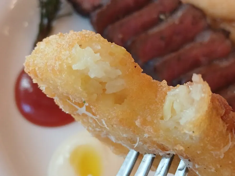 Warm fritters served on the side