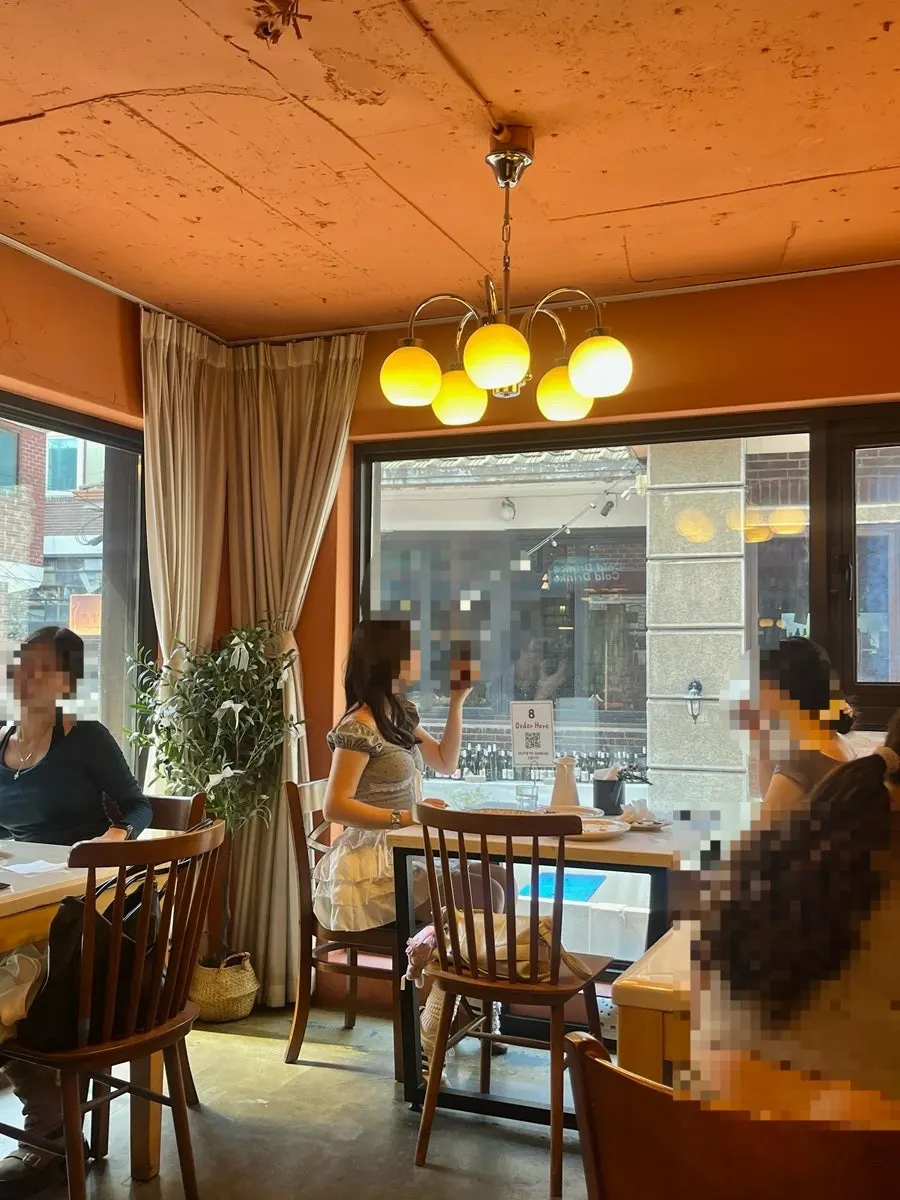 Window seating at Hôtel de Couture overlooking the Yeonnam-dong alley