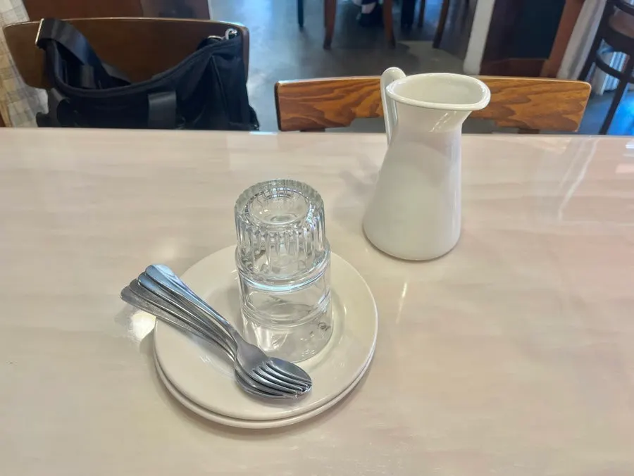 Neatly set tableware at Hôtel de Couture