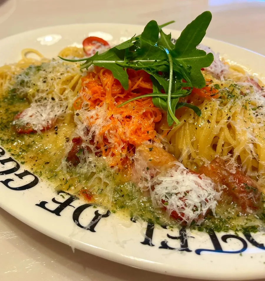 Carrot duck aglio olio topped with cheese