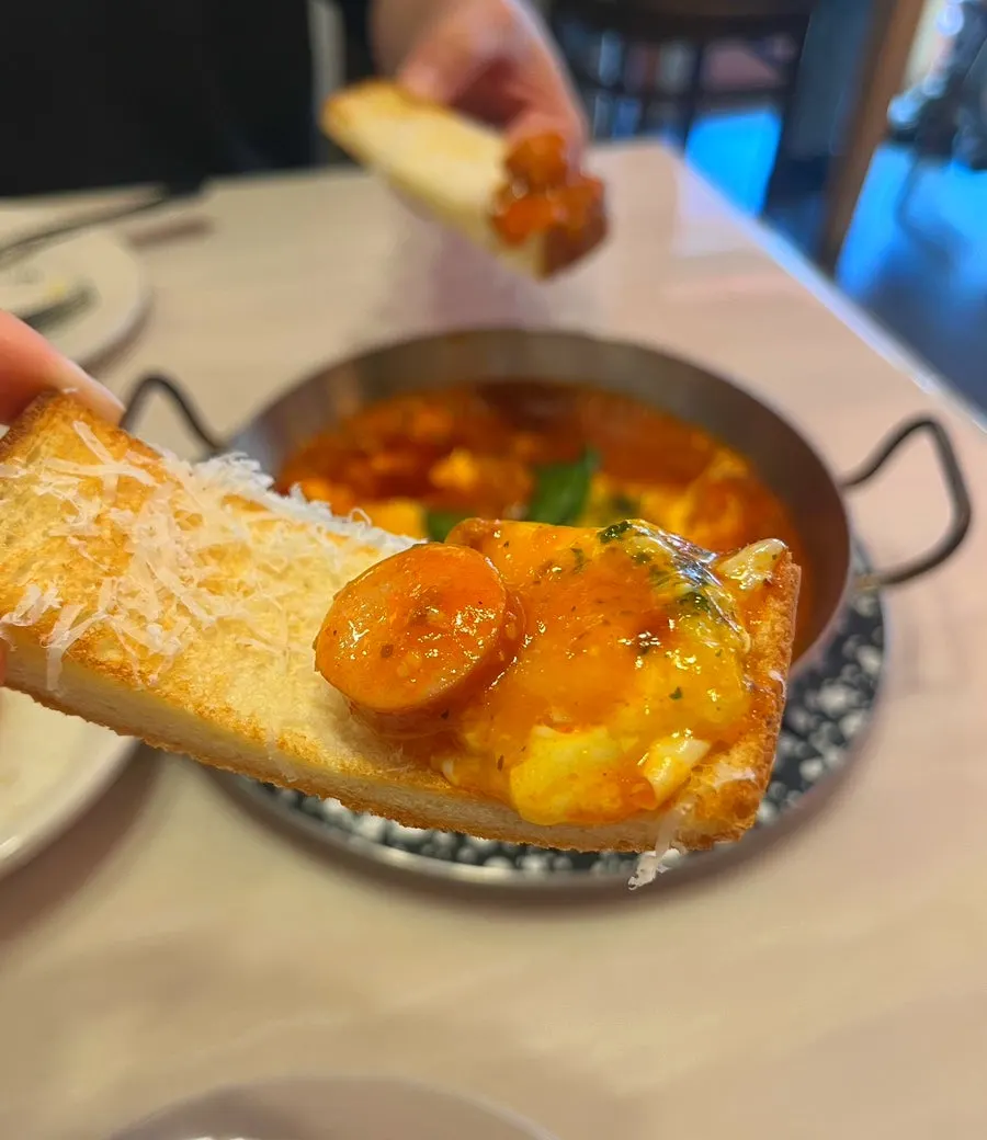 Cheese-loaded bread served on the side