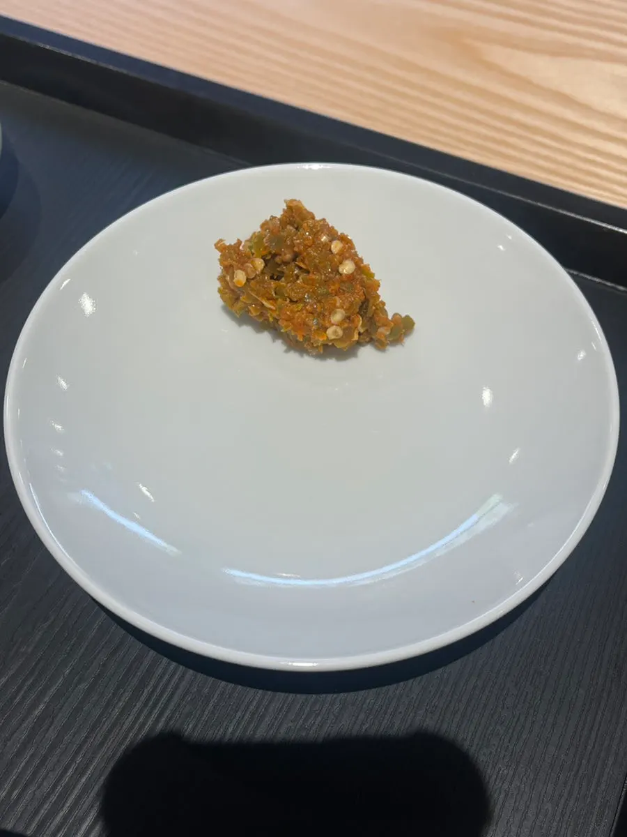 Close-up of gomtang topped with tot